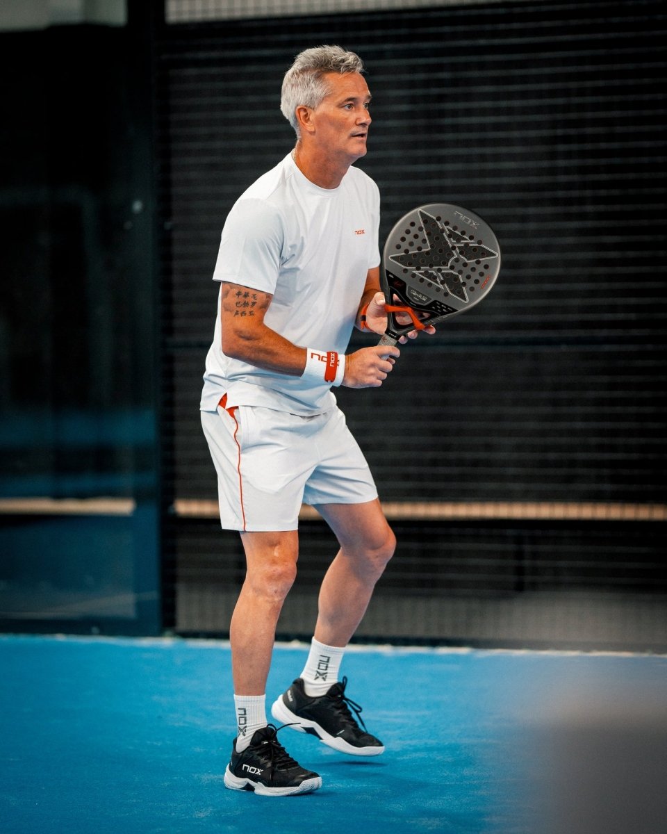 NOX ML10 Ventus Control 3K 2026 Padel Racket with gray face held by a male player in white on a blue court on Tampa Home & Garden Store