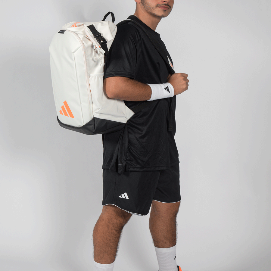 Adidas Padel Bag Backpack 26 white backpack with orange logo worn in black kit on Tampa Home & Garden Store