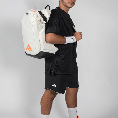 Adidas Padel Bag Backpack 26 white backpack with orange logo worn in black kit on Tampa Home & Garden Store