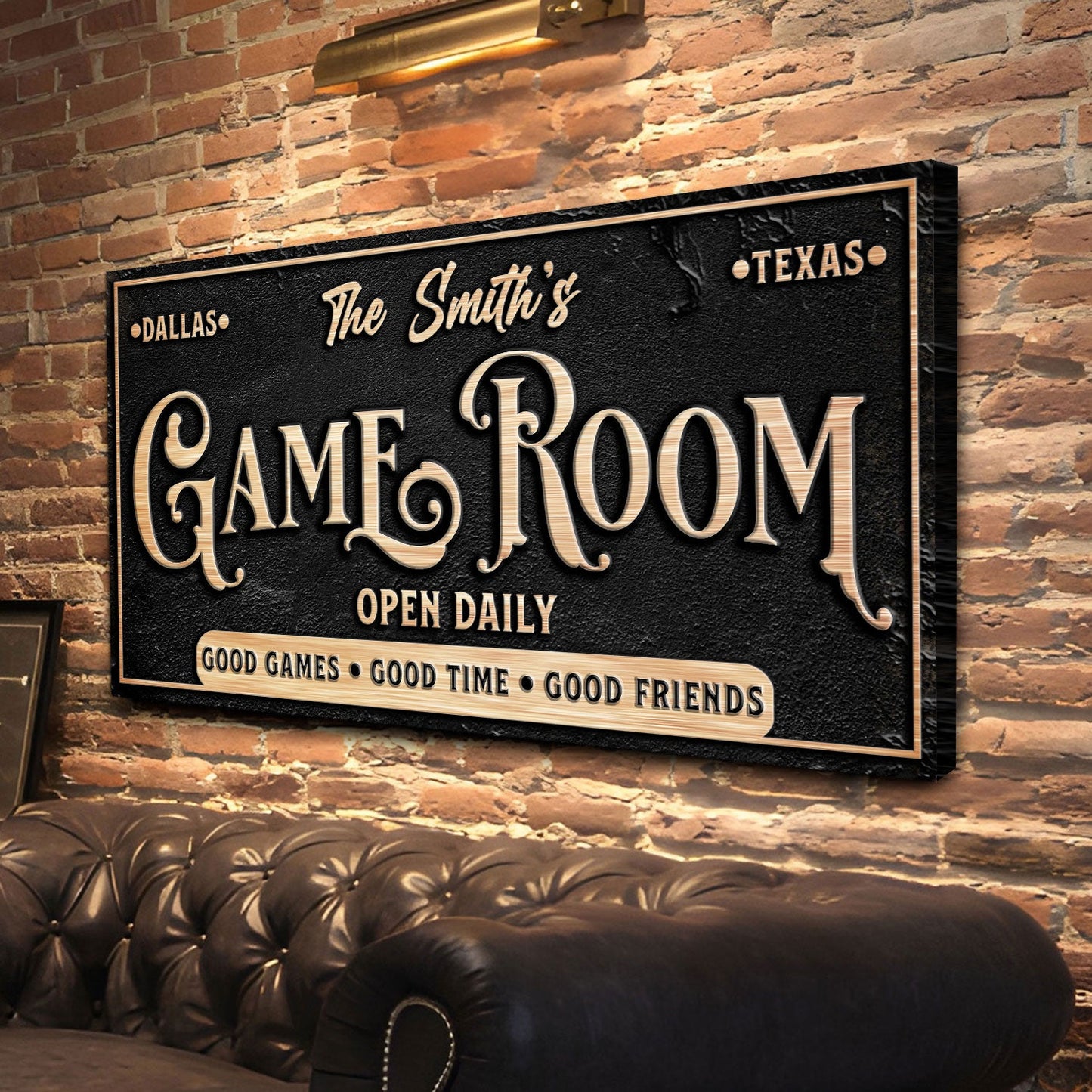 Canvas personalized game room sign with beige raised lettering on black textured brick wall on Tampa Home & Garden Store