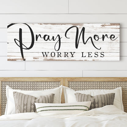 Pray More Worry Less canvas sign with white distressed wood background and black script on Tampa Home & Garden Store
