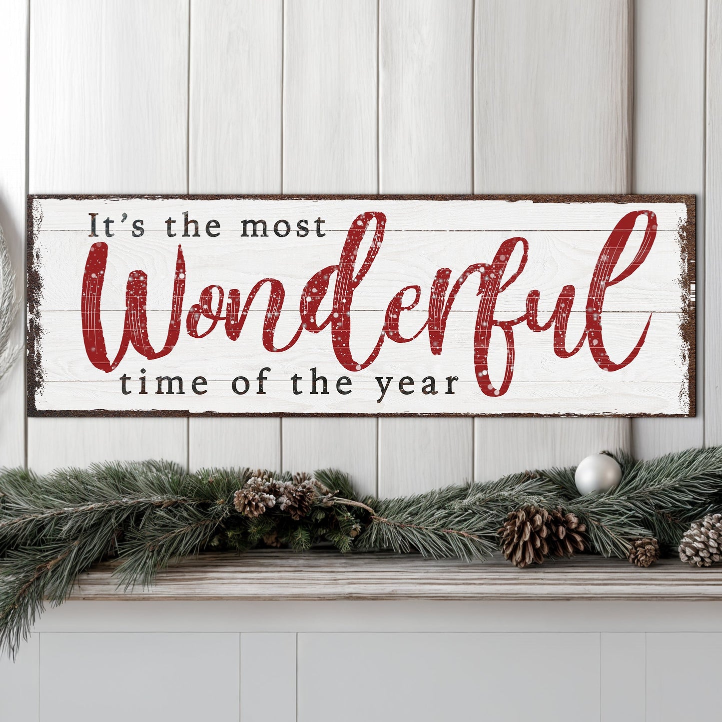 Canvas sign with white background and red script reading It's the most wonderful time of the year on Tampa Home & Garden Store