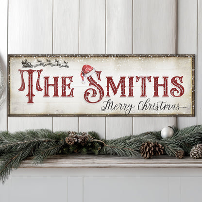 Christmas Family Name Sign IV canvas with red lettering and Santa hat on rustic frame on Tampa Home & Garden Store