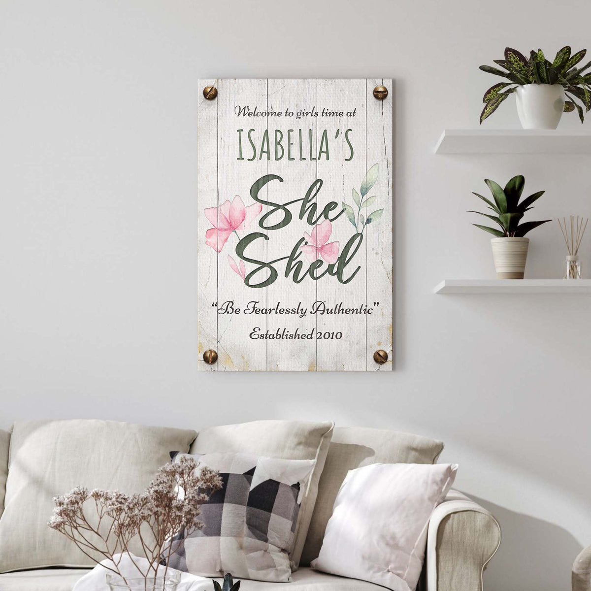 She Shed Sign IV canvas on rustic whitewashed wood with green lettering and pink flowers on Tampa Home & Garden Store