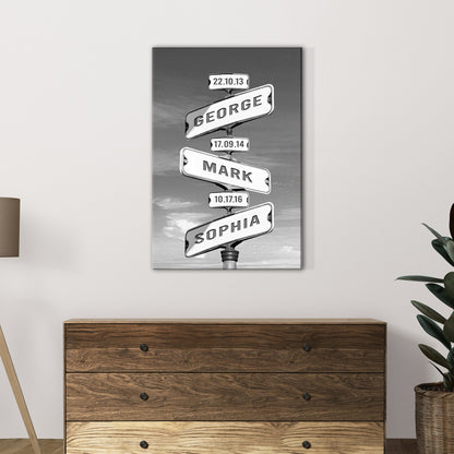 Family Names Road Sign canvas print with multiple white name panels in monochrome on a post on Tampa Home & Garden Store