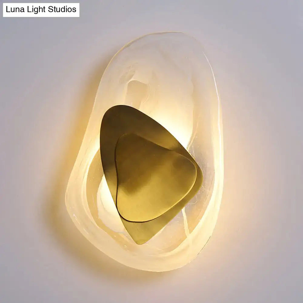 Clear Glass Rock Sconce with brass interior panels by Decorbites on Tampa Home & Garden Store