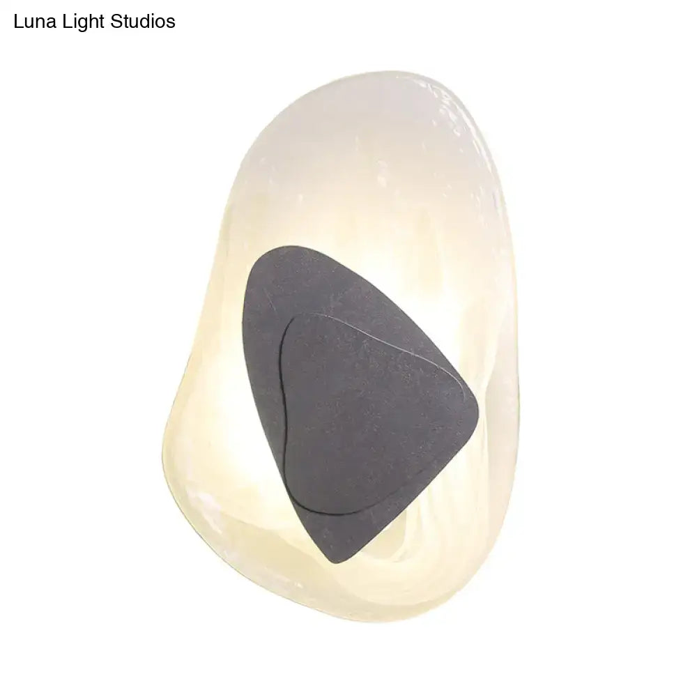 Clear glass rock sconce with a dark triangular inner accent Decorbites on Tampa Home & Garden Store