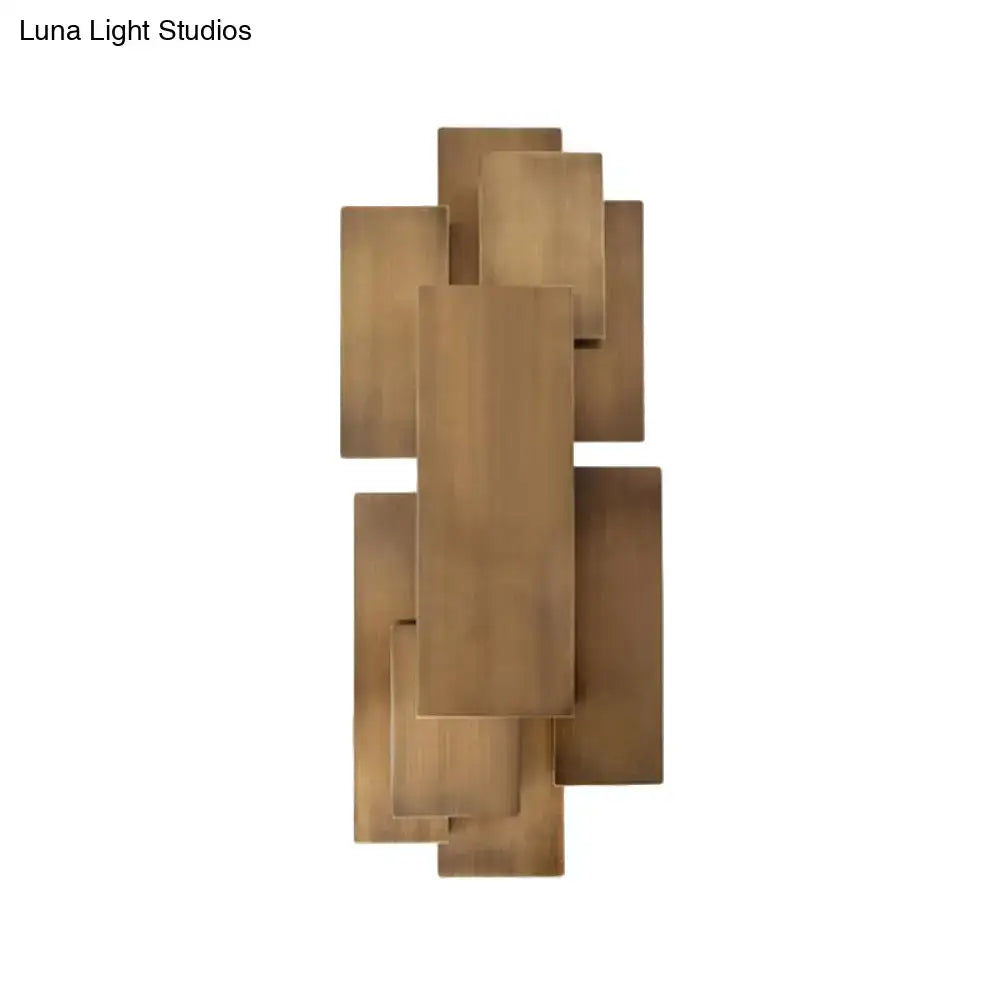 Dark wood wall sconce with stacked rectangular panels, modern decor on Tampa Home & Garden Store