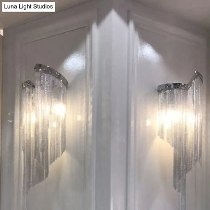 Pair of silver tassel wall lights with crystal bead strands in chrome finish Decorbites on Tampa Home & Garden Store