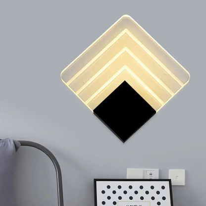 Decorbites silver black square sconce wall light with layered square frames and warm glow on Tampa Home & Garden Store