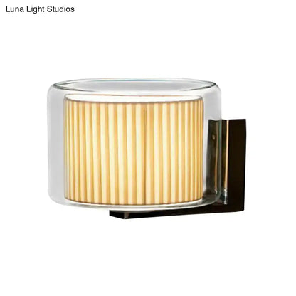 Amber Pleated Wall Lamp warm amber glass with clear outer shell and dark metal wall mount Decorbites on Tampa Home & Garden Store