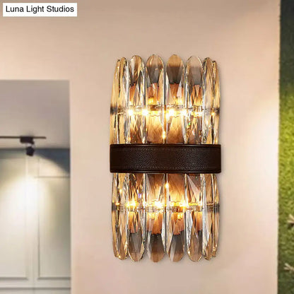 Decorbites black crystal wall sconce with dual-row faceted prisms and a textured black band on Tampa Home & Garden Store