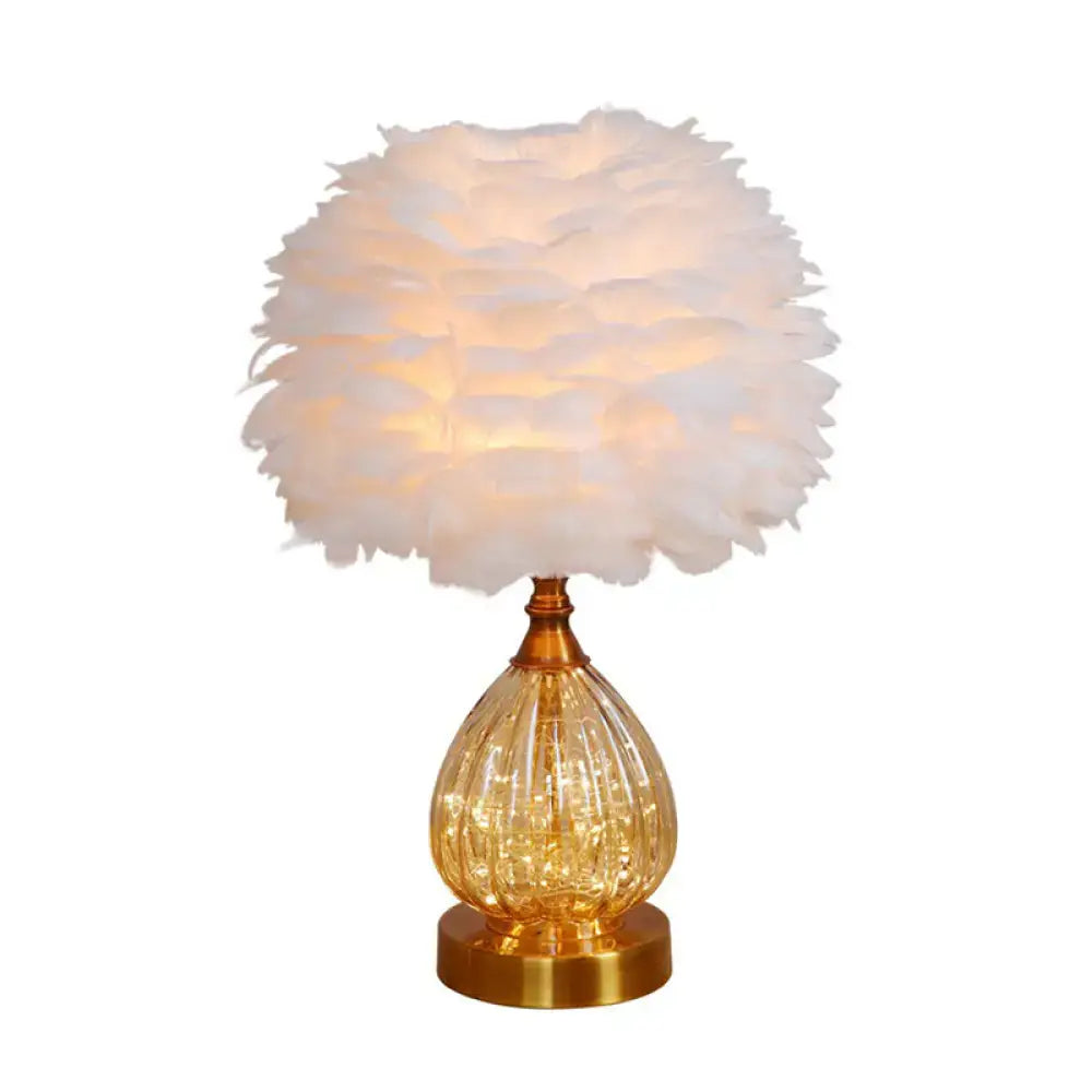 Amber Glass Night Light with feather shade by Decorbites and golden base warm glow on Tampa Home & Garden Store