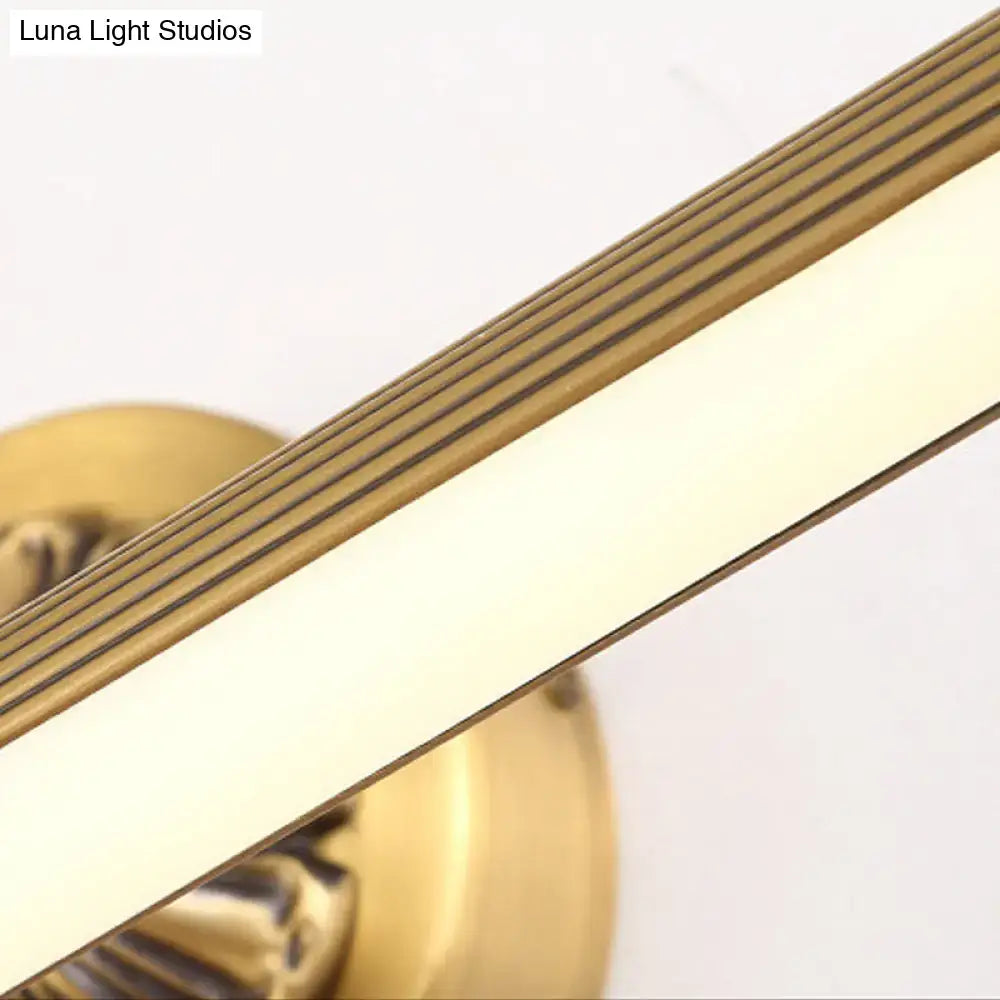 Brass modern wall light by Decorbites with white diffuser and ribbed edge design on Tampa Home & Garden Store