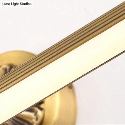 Brass modern wall light by Decorbites with white diffuser and ribbed edge design on Tampa Home & Garden Store