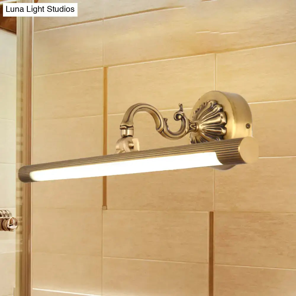 Brass modern wall light with ornate scroll arm and slim LED bar by Decorbites on Tampa Home & Garden Store
