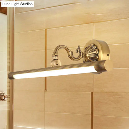 Brass modern wall light with ornate scroll arm and slim LED bar by Decorbites on Tampa Home & Garden Store
