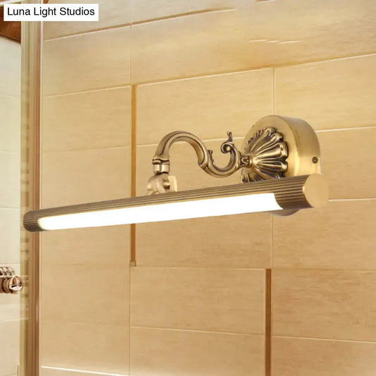 Brass modern wall light with ornate scroll arm and slim LED bar by Decorbites on Tampa Home & Garden Store