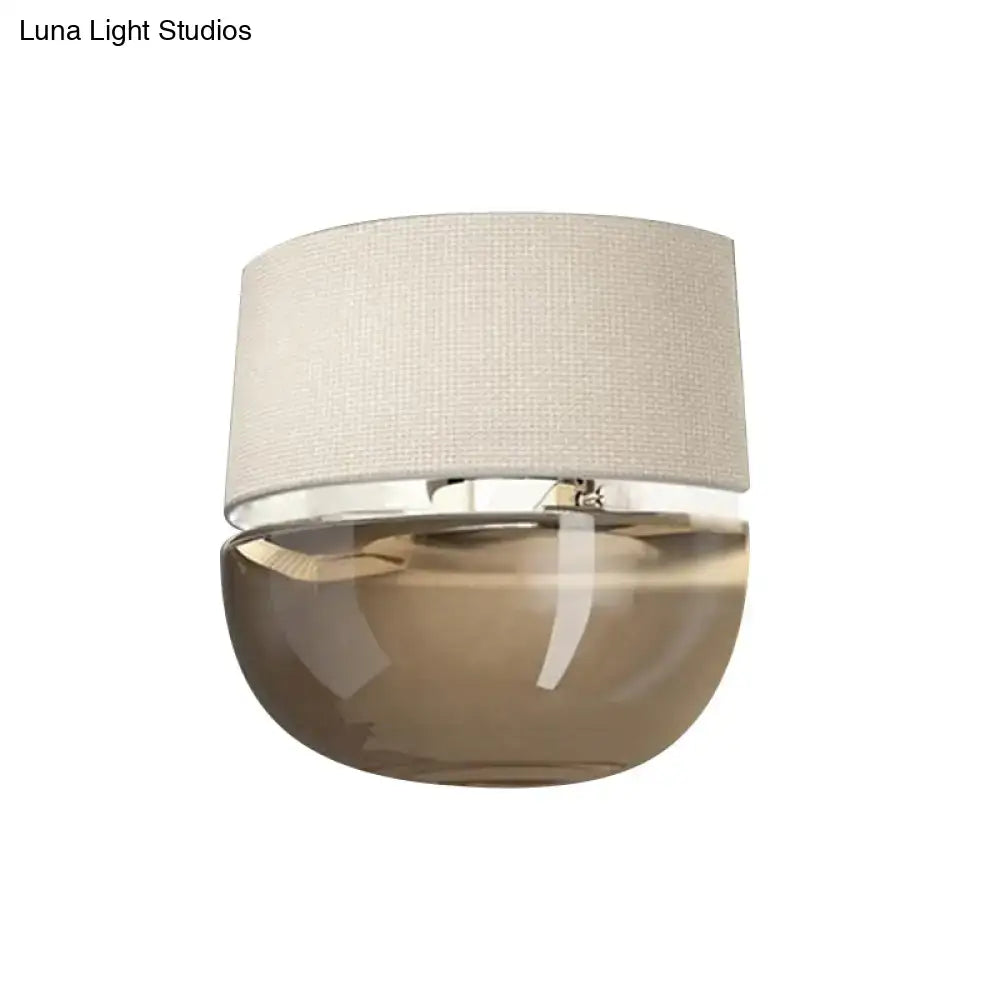 Amber Arched Tan Glass Sconce by Decorbites with beige fabric shade on Tampa Home & Garden Store