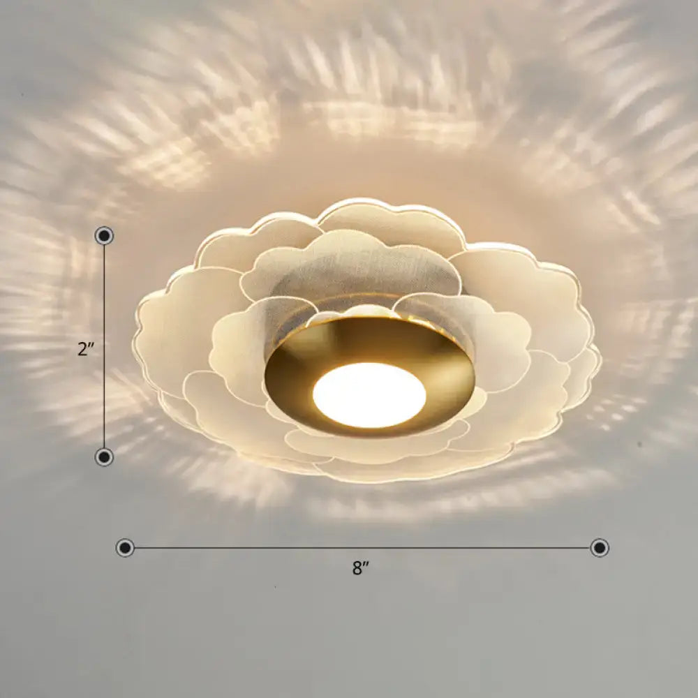 White gold flower sconce with white layered petals and gold center, 8-inch diameter ceiling mount on Tampa Home & Garden Store