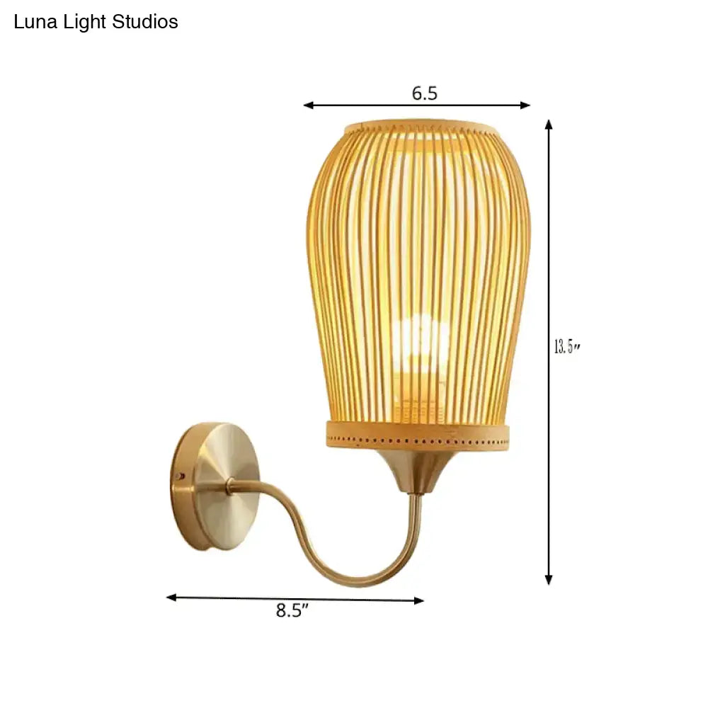 Decorbites Bamboo Cage Wall Sconce with brass finish and bamboo slat cage on Tampa Home & Garden Store
