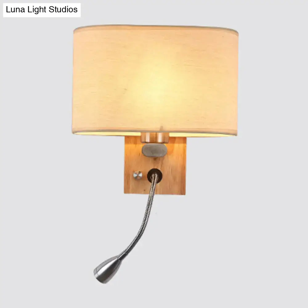 Beige fabric reading lamp mounted on wooden wall sconce with flexible chrome neck on Tampa Home & Garden Store