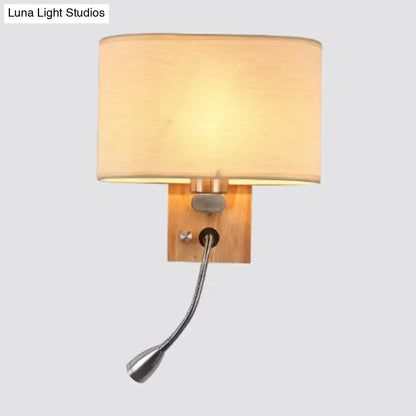 Beige fabric reading lamp mounted on wooden wall sconce with flexible chrome neck on Tampa Home & Garden Store
