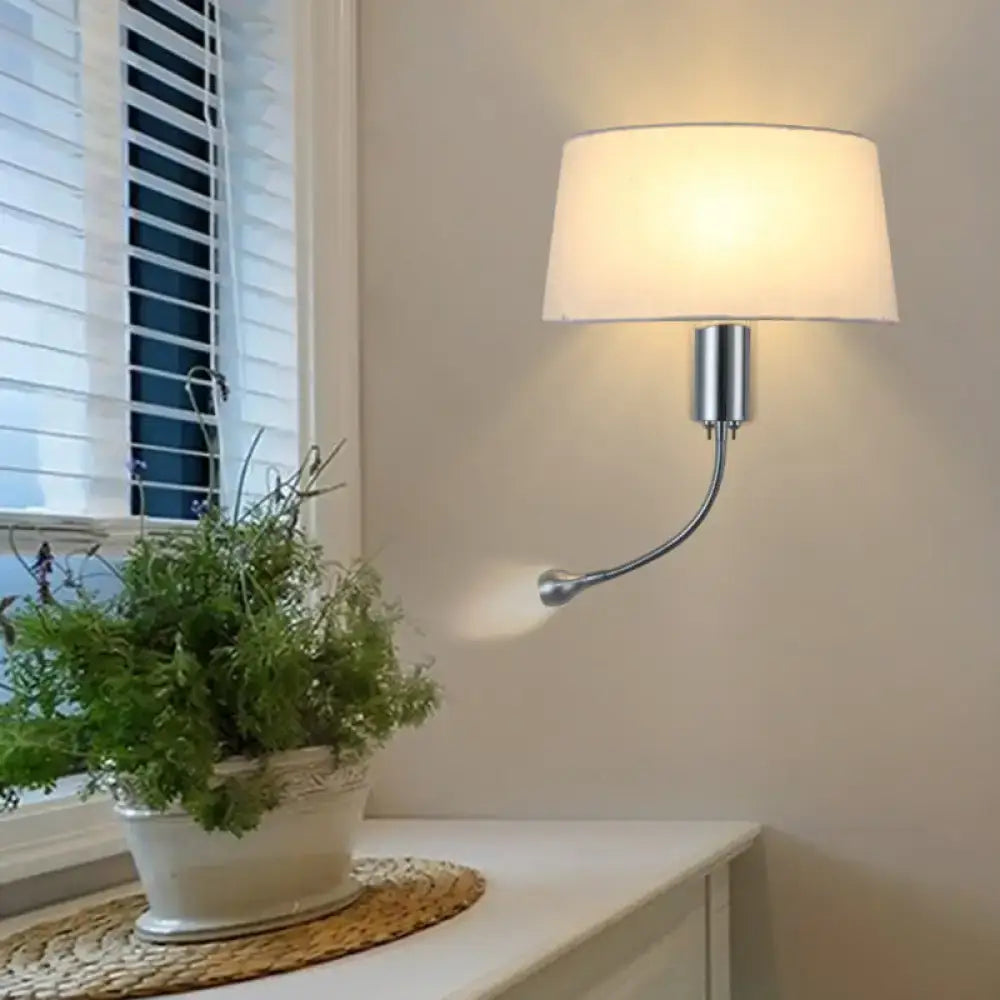 Beige flush wall sconce by Decorbites with curved chrome arm and fabric shade, wall mounted on Tampa Home & Garden Store