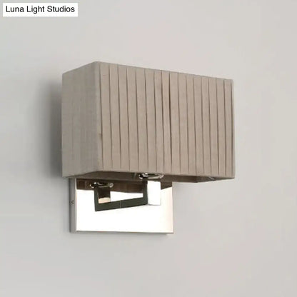 Beige rectangle wall sconce with a pleated fabric shade atop a chrome square mount on Tampa Home & Garden Store