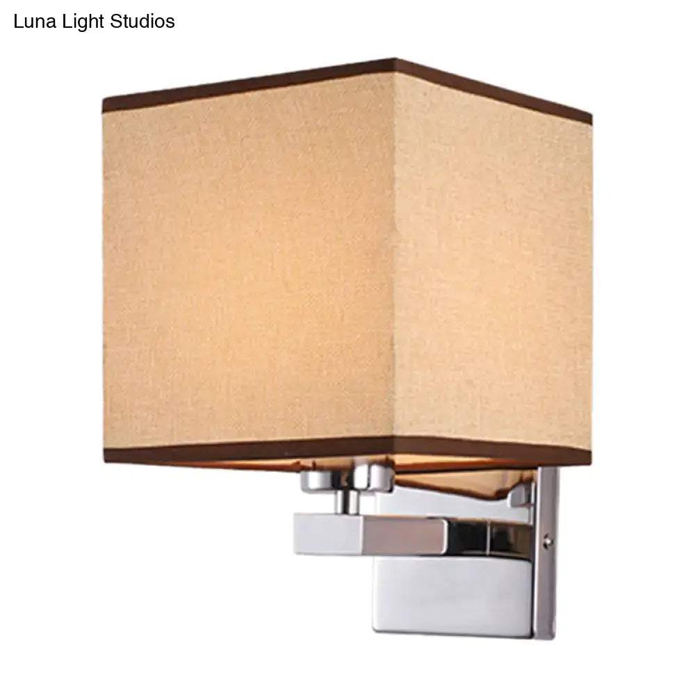 Beige fabric shade wall sconce with chrome mount and brown trim Decorbites on Tampa Home & Garden Store