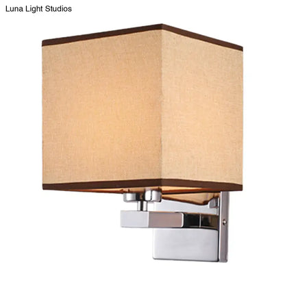 Beige fabric shade wall sconce with chrome mount and brown trim Decorbites on Tampa Home & Garden Store