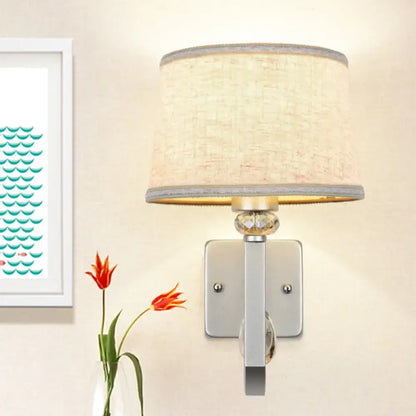 Beige crystal wall sconce by Decorbites with fabric shade and chrome backplate on Tampa Home & Garden Store