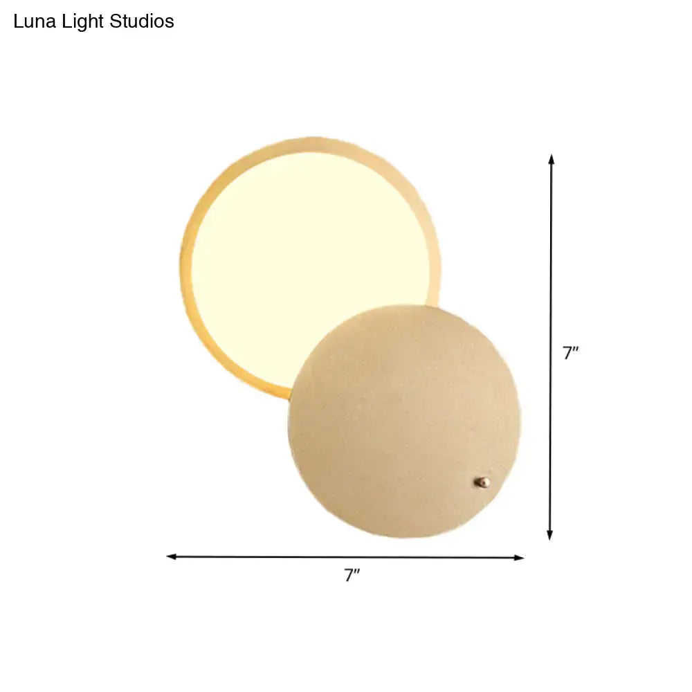 Gold metal wall lamp with overlapping orb design by Decorbites, 7in diameter on Tampa Home & Garden Store