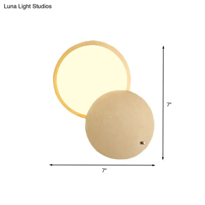 Gold metal wall lamp with overlapping orb design by Decorbites, 7in diameter on Tampa Home & Garden Store