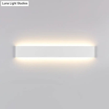 Black LED Vanity Sconce by Decorbites, slim wall light with warm top and bottom glow on Tampa Home & Garden Store