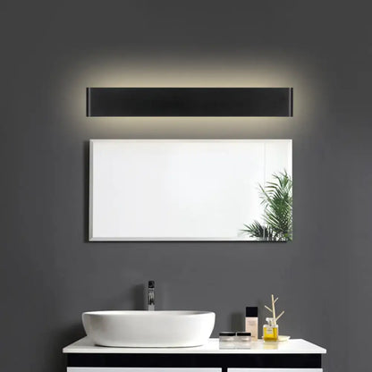 Black LED vanity sconce Decorbites, wall-mounted above a vanity mirror on dark wall on Tampa Home & Garden Store