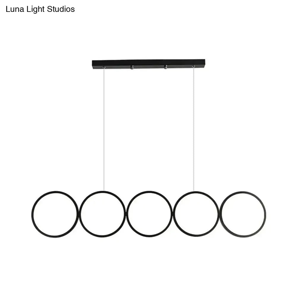 Decorbites modern black five-ring LED pendant light for dining island ceiling-hung fixture on Tampa Home & Garden Store