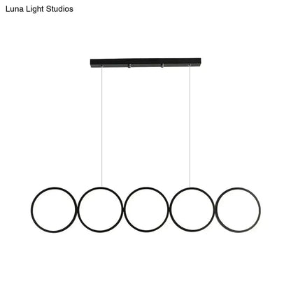 Decorbites modern black five-ring LED pendant light for dining island ceiling-hung fixture on Tampa Home & Garden Store