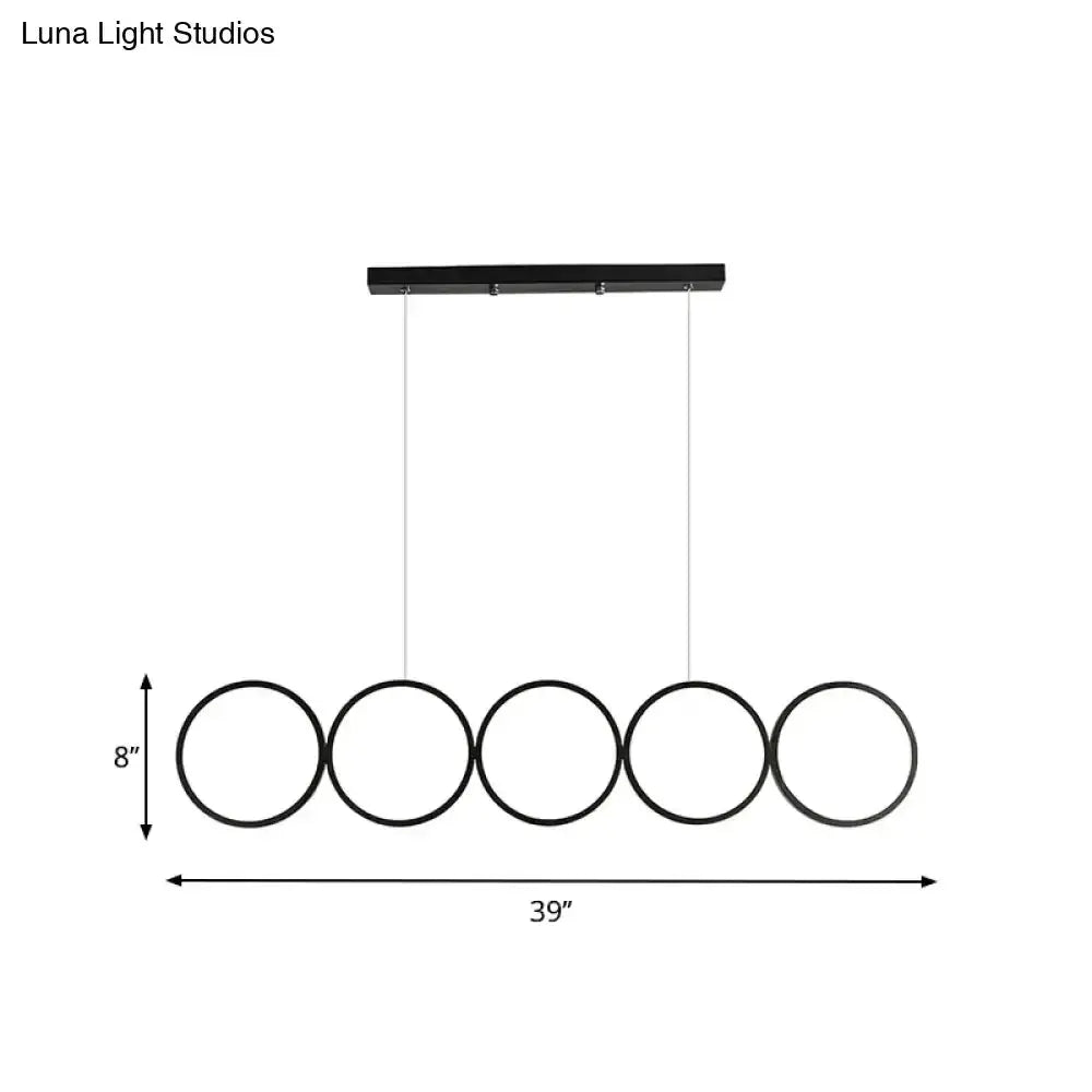 Decorbites modern black 5-ring LED pendant light for dining room hanging island on Tampa Home & Garden Store