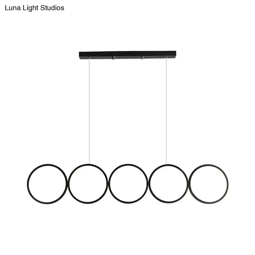 Modern black 5-ring LED pendant light by Decorbites for dining room on Tampa Home & Garden Store
