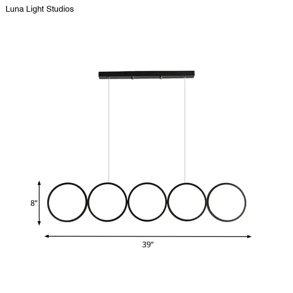 Modern black 5-ring LED pendant light with five rings on a ceiling mount on Tampa Home & Garden Store