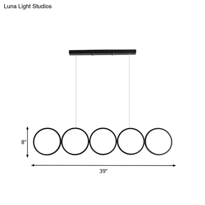 Modern black 5-ring LED pendant light with five rings on a ceiling mount on Tampa Home & Garden Store