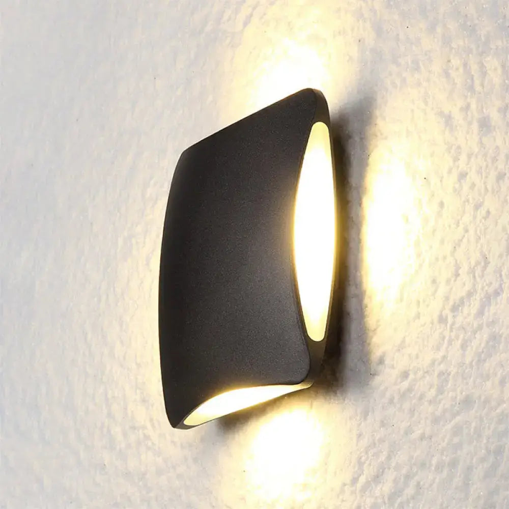 Black Diamond LED Sconce by Decorbites, matte black metal wall light with warm glow on Tampa Home & Garden Store