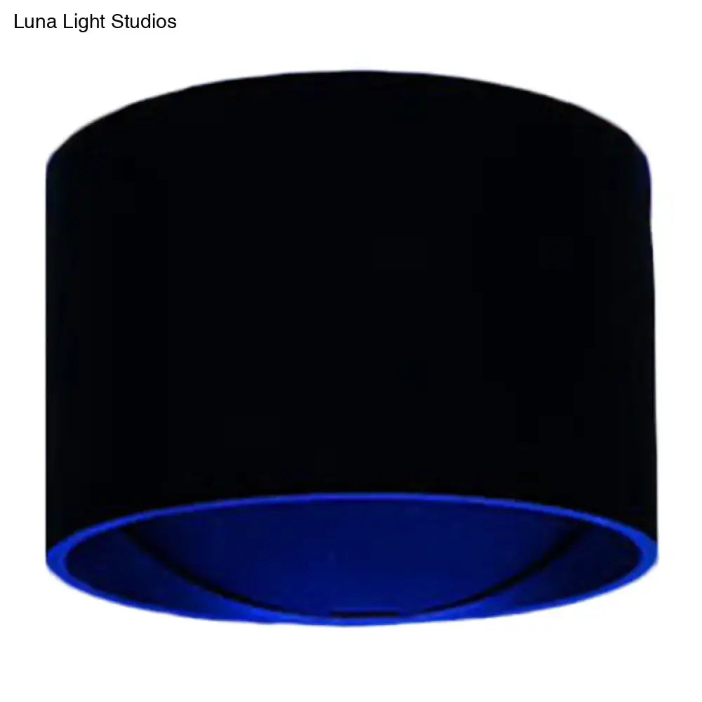 Black Velvet Circle Sconce by Decorbites with blue interior glow on Tampa Home & Garden Store
