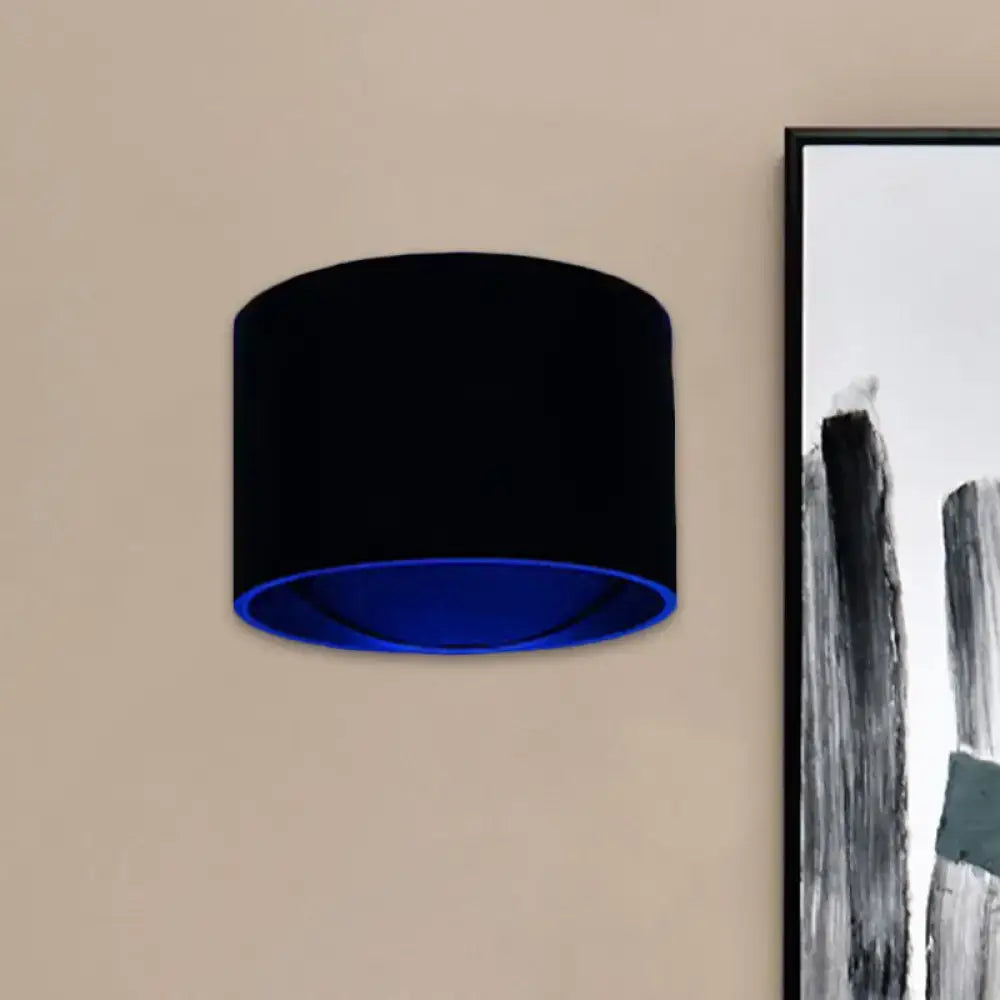 Black Velvet Circle Sconce by Decorbites, wall-mounted with blue inner glow on Tampa Home & Garden Store