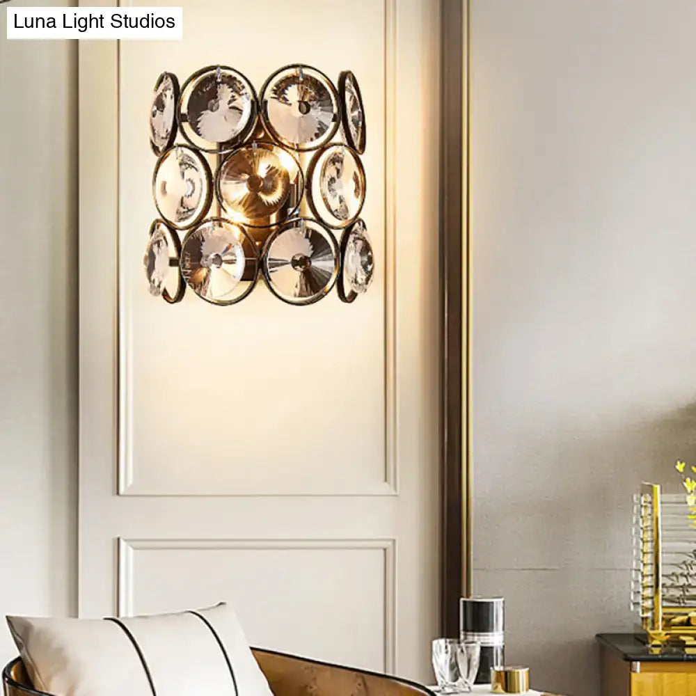 Crystal brass wall sconce with circular crystal discs, Decorbites home lighting on Tampa Home & Garden Store