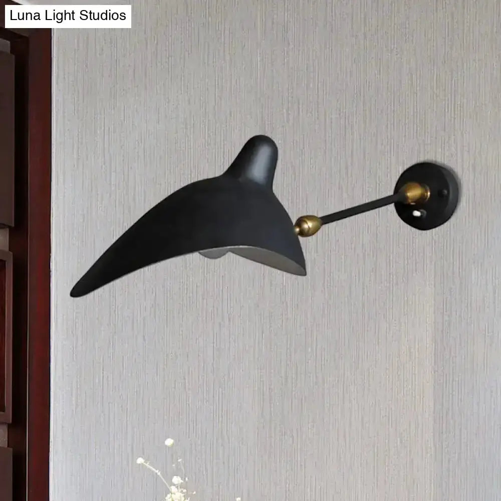 Duckbill wall lamp in black and brass with metallic shade on Tampa Home & Garden Store