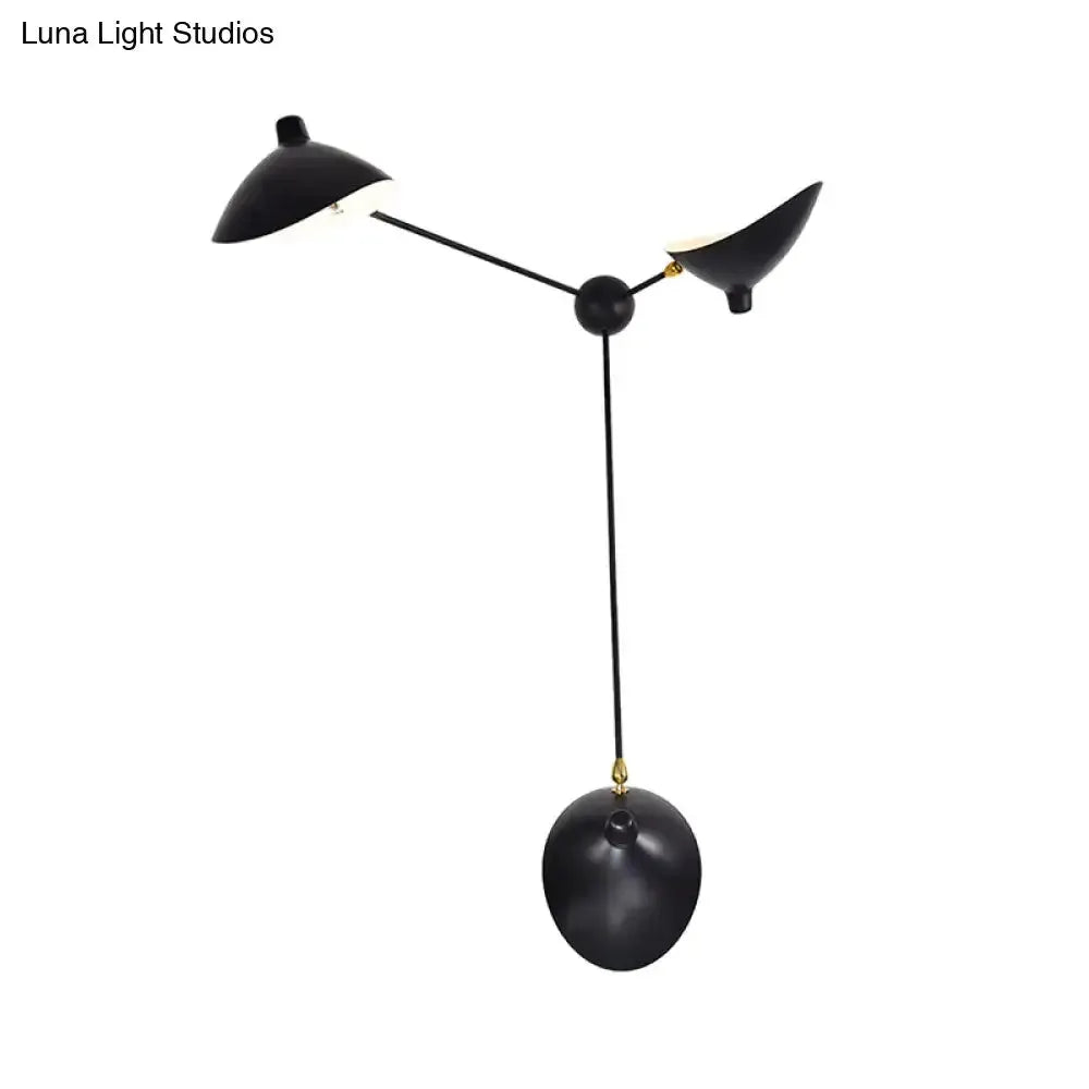 Modern black and brass duckbill wall lamp with metallic shade Decorbites living room on Tampa Home & Garden Store