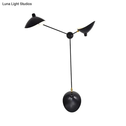 Modern black and brass duckbill wall lamp with metallic shade Decorbites living room on Tampa Home & Garden Store