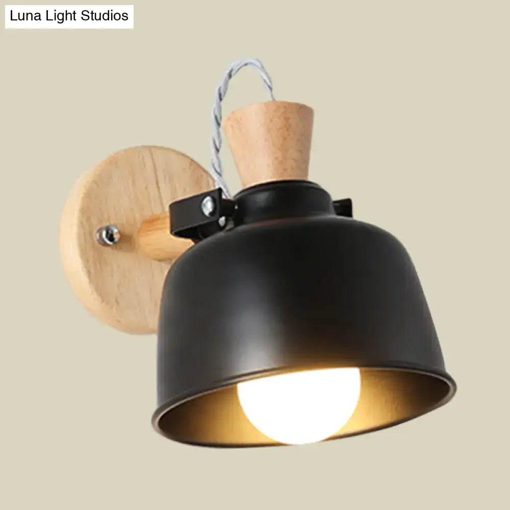 Black brass wood sconce with black metal shade and natural wood backplate, cork accent on Tampa Home & Garden Store